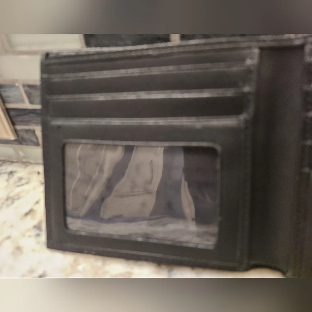 Tumi Black Leather Bifold Wallet